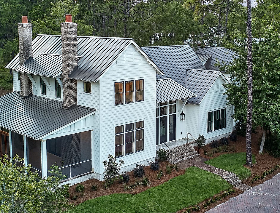 White two story home with porch