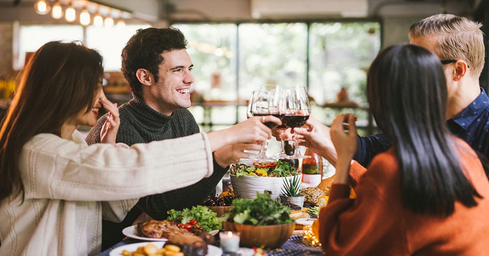 Group toasting with wine